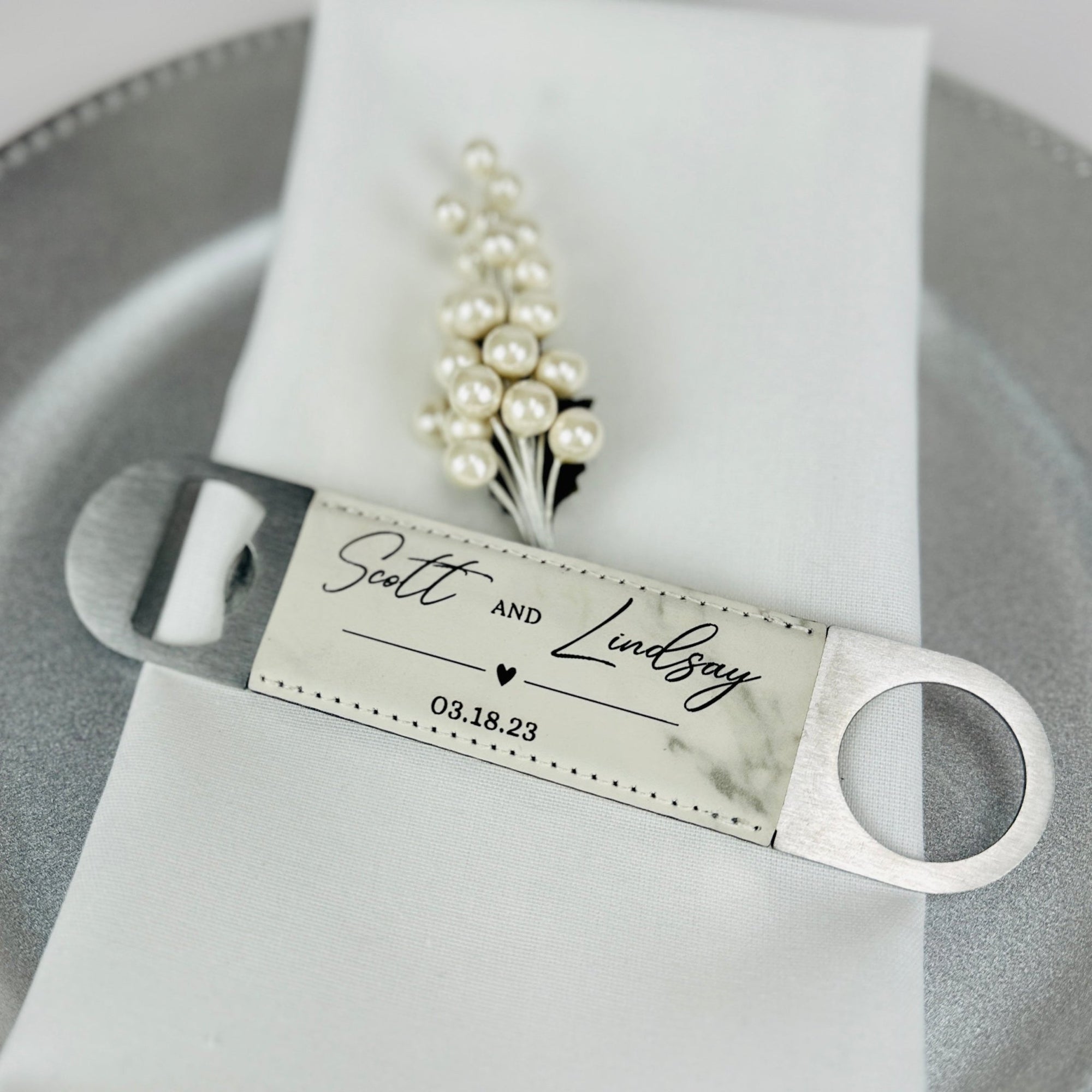 https://www.foreverweddingfavors.com/cdn/shop/products/forever-romance-bottle-opener-795577_2000x.jpg?v=1686403073