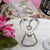 Heart Shaped Silver Metal Bottle Opener with Dangling Heart Design - Forever Wedding Favors